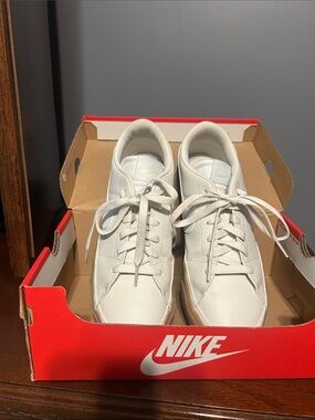 Nike women’s White Leather Low-Top Sneakers. Like new, size 9
